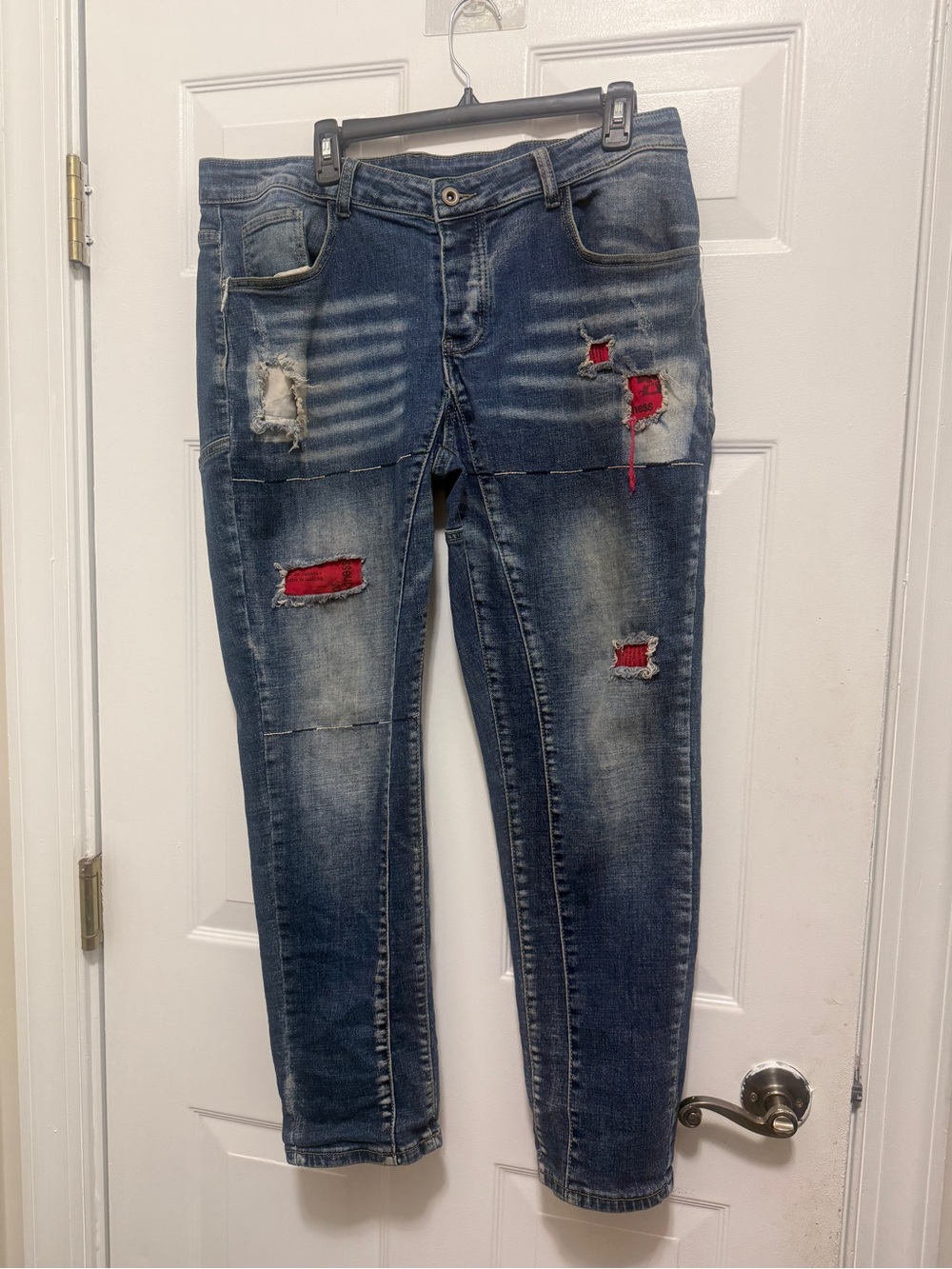 Blue Skinny Jeans with Red Patch Accents